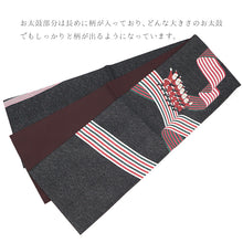 画像をギャラリービューアに読み込む, 《召しませ華》お仕立て上がり 全通お太鼓柄 アルジョンテ ラメ 黒地 サンタクロース リボン ラインダンス 京袋帯(ブラック)