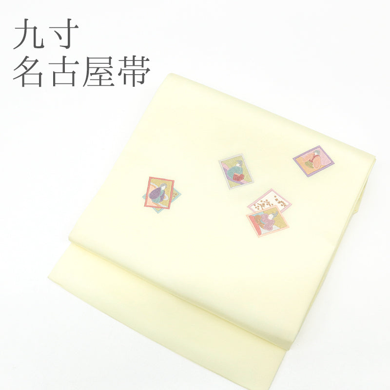 名古屋帯 黄色地にかるた 雅の遊び （クリームイエロー ）